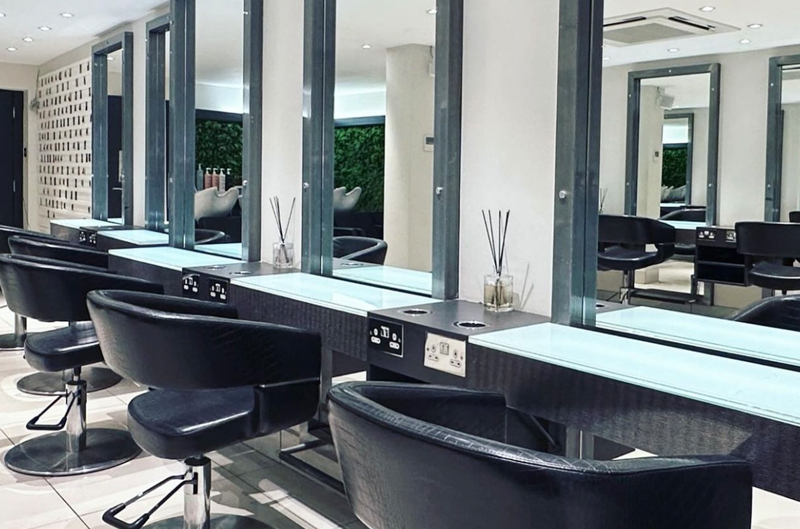 Close up image of hairdressing salons stations and mirrors