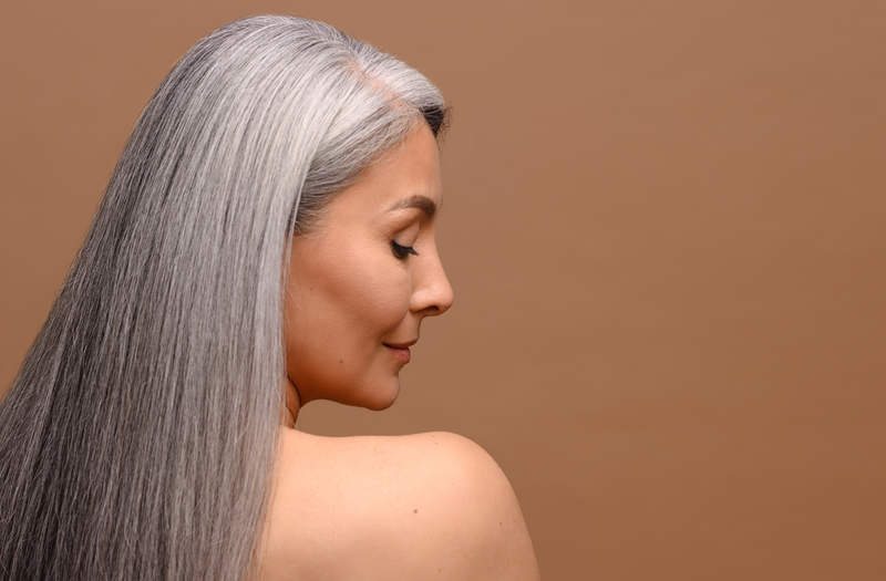 Woman with long grey hair