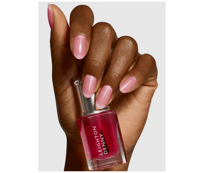 A hand with nails painted in Leighton Denny Less is More polish