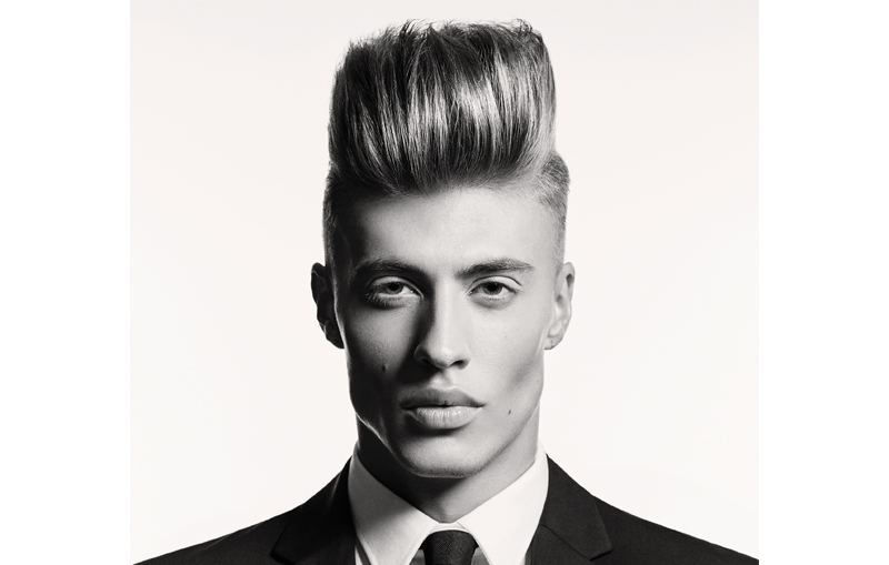 Man with a slicked back quiff hairstyle