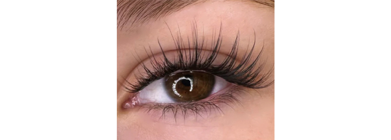 Close image of an eye wearing Soft Volume Bonded lashes