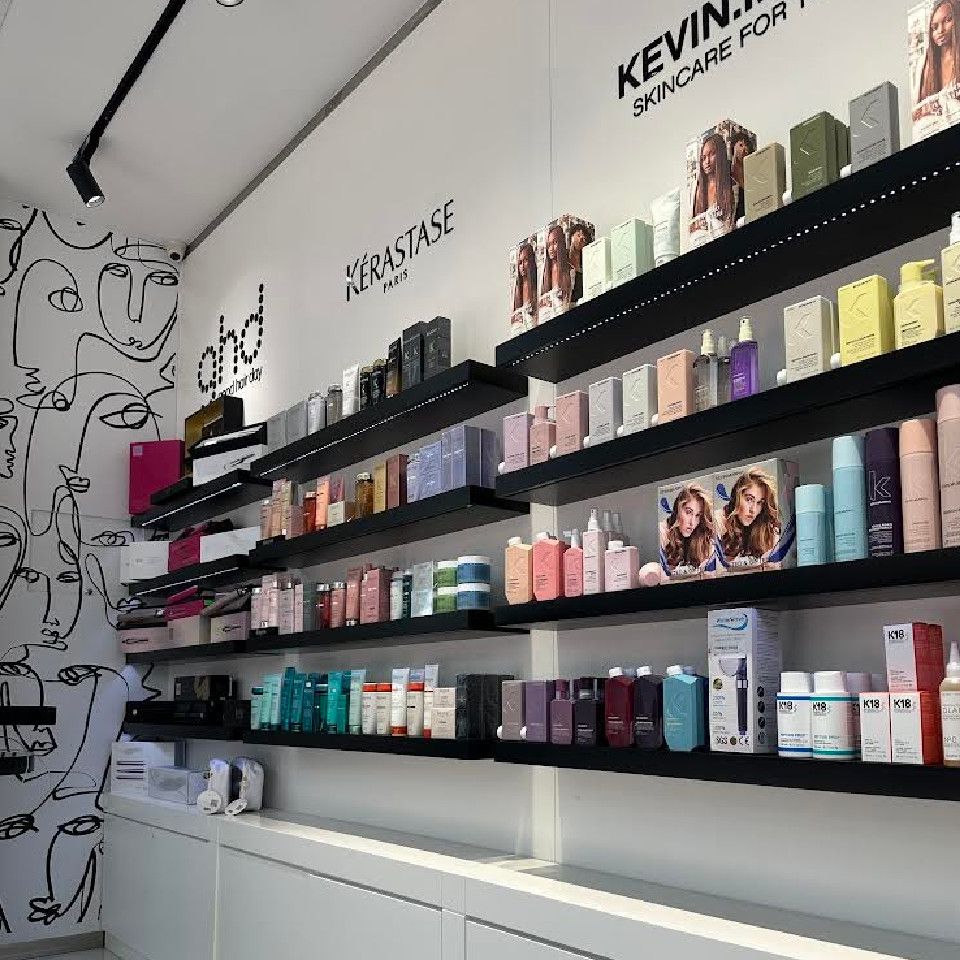 Kerastase and ghd products display on the back wall