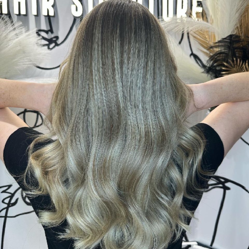 Blonde long, wavy and shiny hair