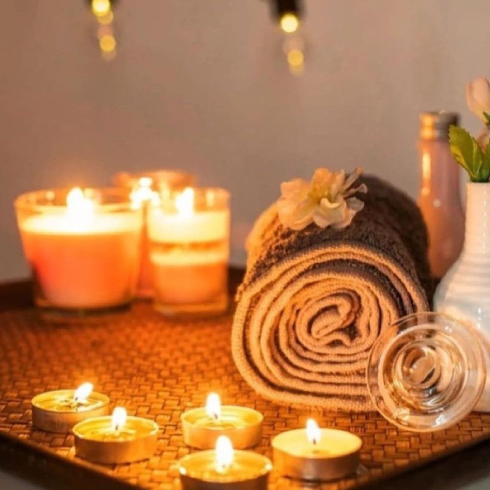 Jessie's Hair & Beauty candles and towels