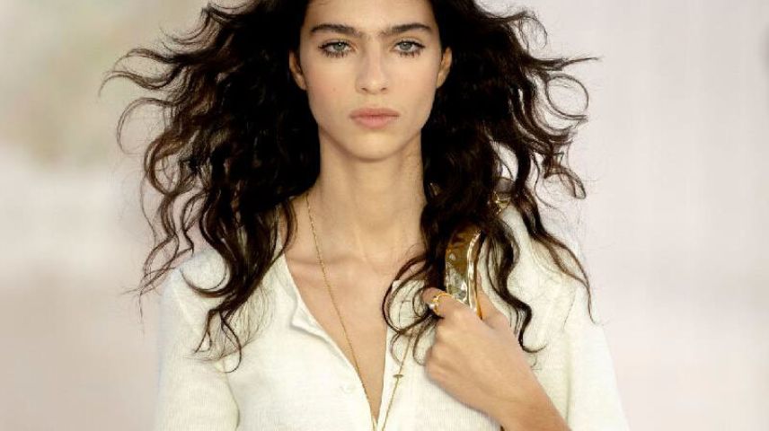 Female model with flowing long hair walking the Chloe runway