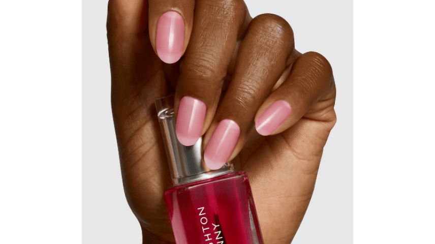 A hand with nails painted in Leighton Denny Less is More polish